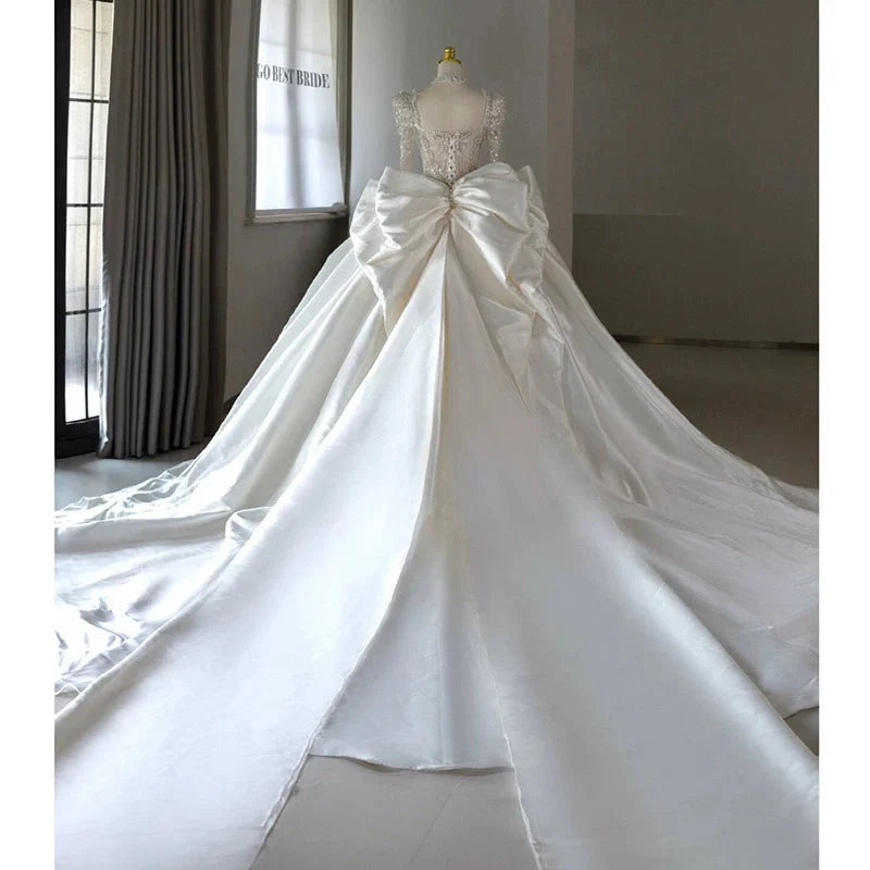 Buyishang Chic Ball Gown Sweetheart White Long Sleeves Satin Wedding Dresses With Beads Bow dress for wedding