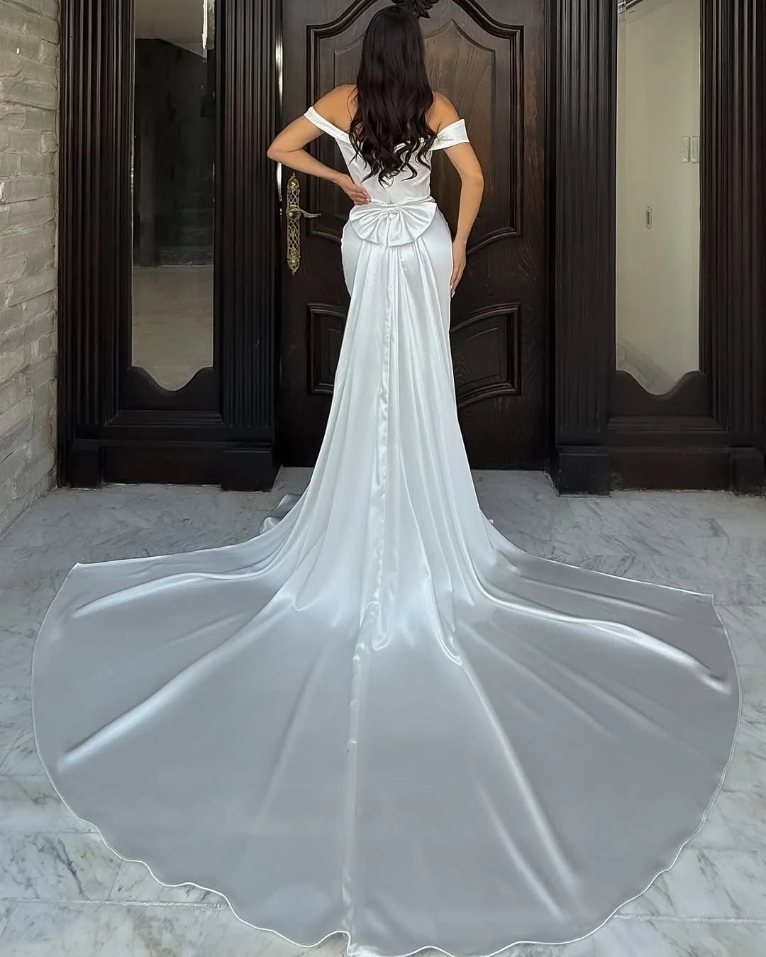 Elegant Mermaid Off-Shoulder Bow White Train Wedding Dress